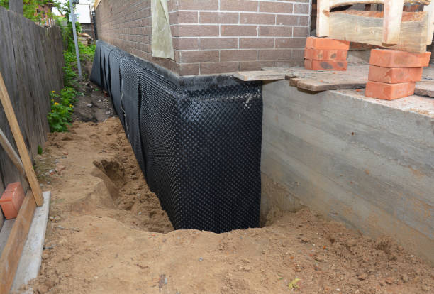 SJ Waterproofing Pros technician performing targeted Vapor Barrier Installation assessment in Grand River, OH